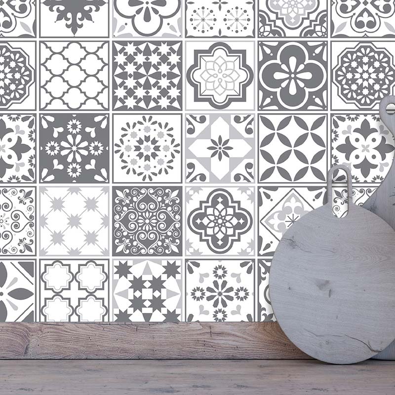 Grey patterned tile design vinyl wrap used as a kitchen backsplash